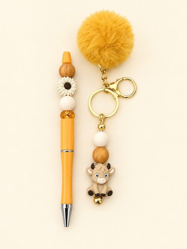 Cow beaded pom - beaded,
